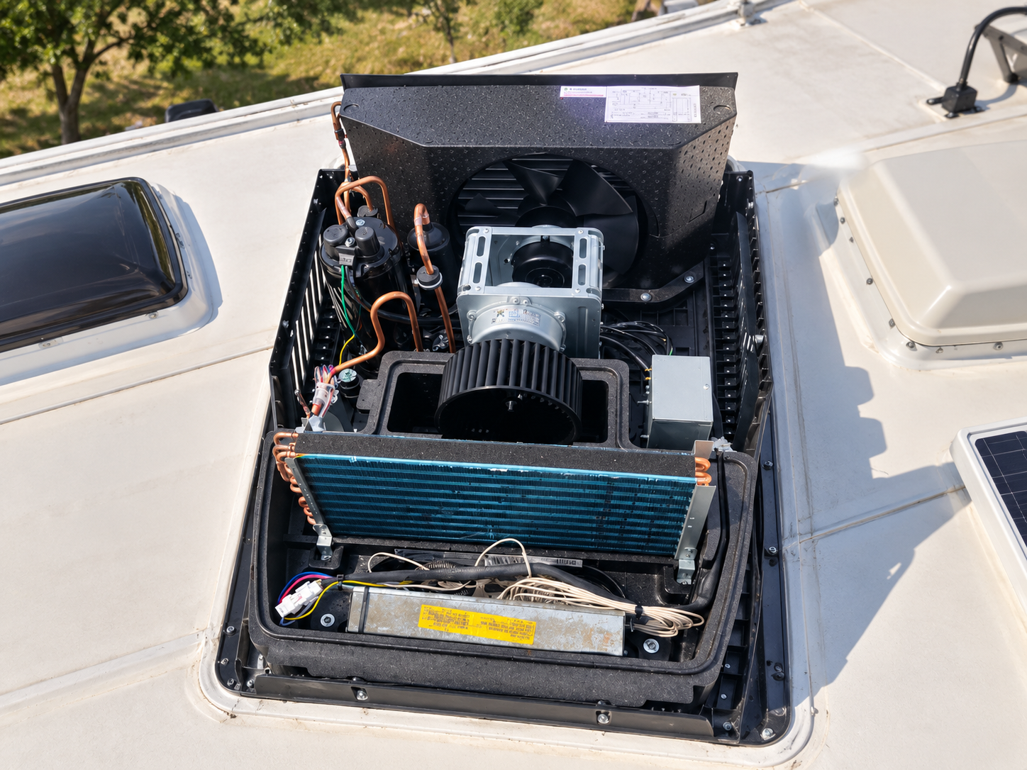 Furrion Chill Cube RV rooftop air conditioner with the cover removed